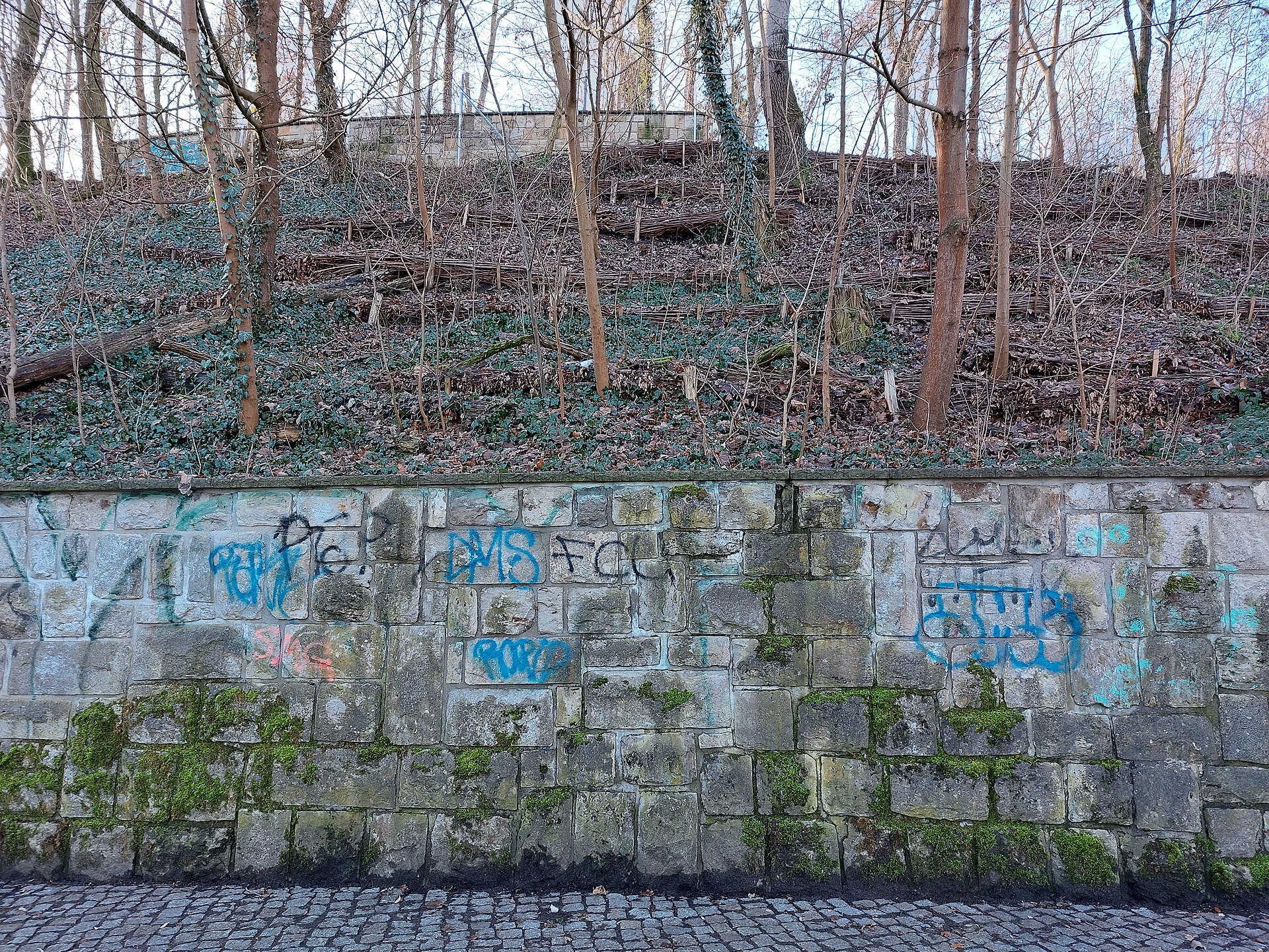 The green Großer Bunkerberg (Mont Klamott) in Volkspark Friedrichshain, Berlin, a hill built over a buried WWII bunker